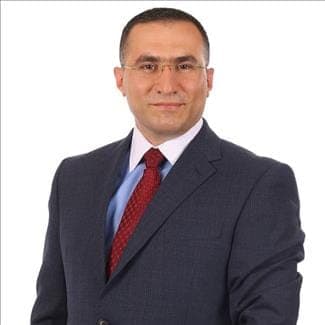 شعار عيادة د. أحمد محمد الطراونة — جراحة الأعصاب