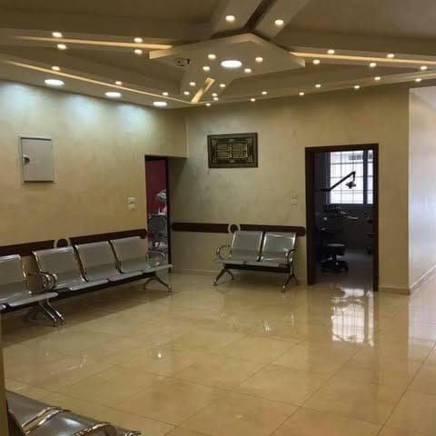 Dr Manal Gharaibeh Dental Center logo