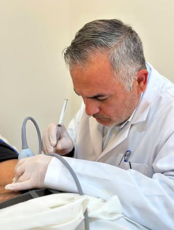 Dr. Mohammad Bushnaq — Pain Management in Amman
